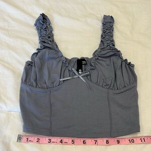 Garage grey XS ruffle crop tank with cinching at bust and bow